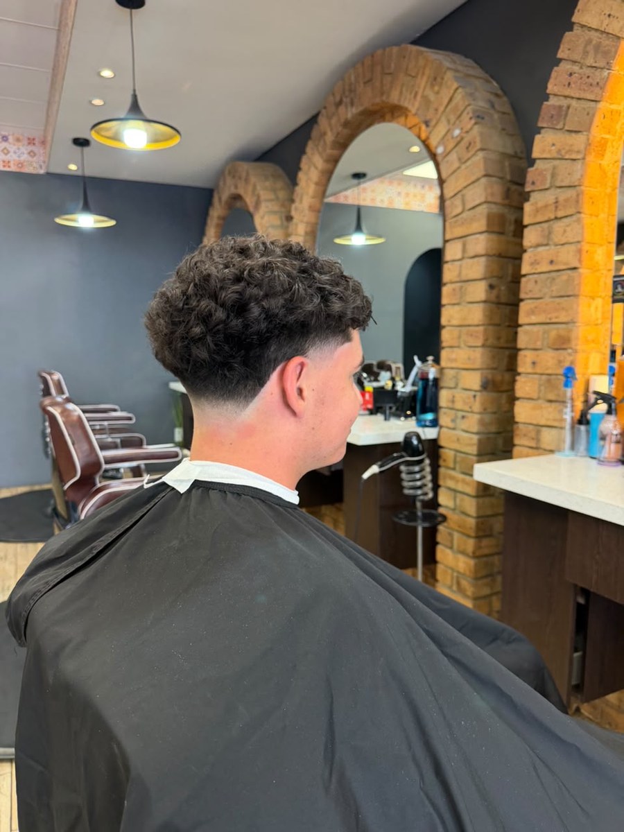 Finished curly taper, side profile at Kasbah Barber